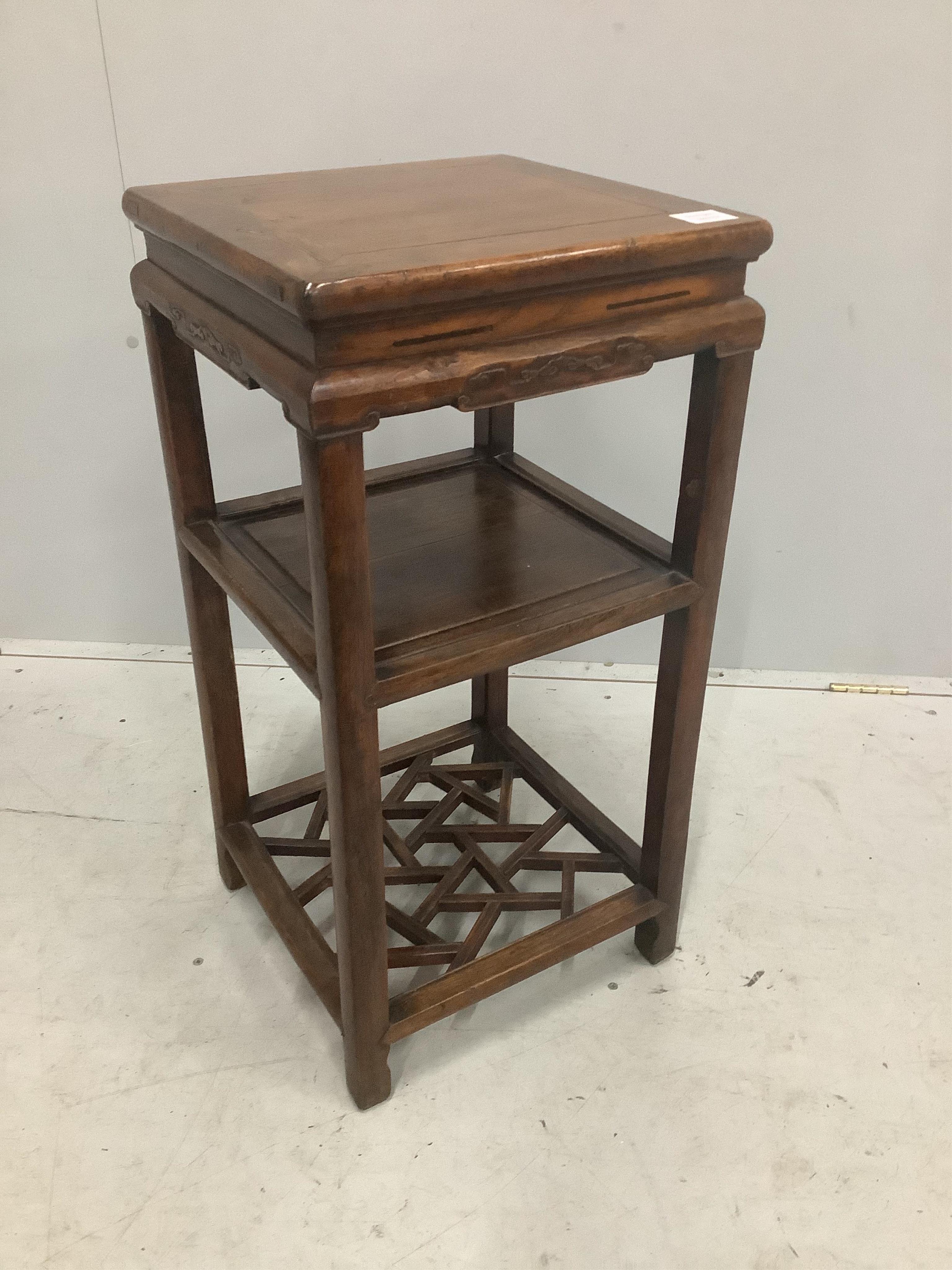 An 18th / 19th century Chinese elm stand, width 37cm, depth 37cm, height 75cm. Condition - fair